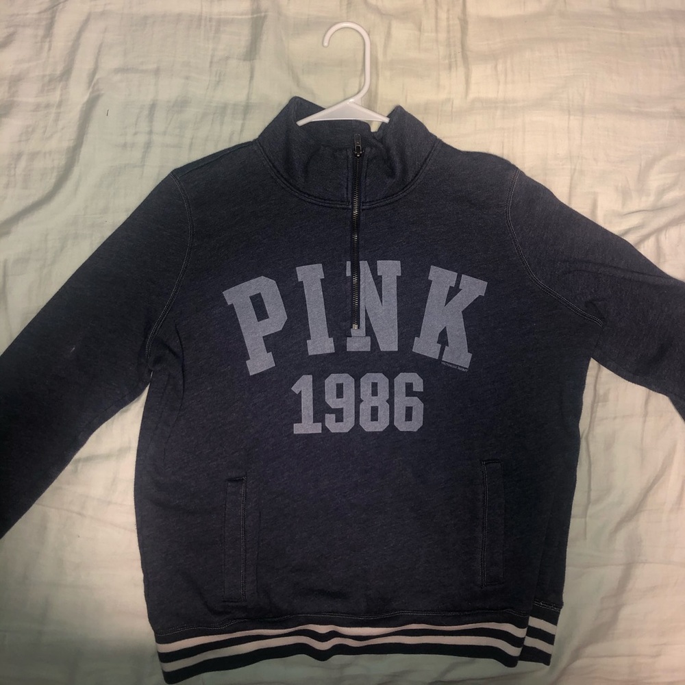Pink sweatshirt.
